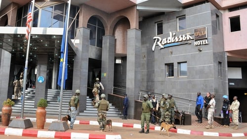 Security forces surrounding the Radisson Hotel in Bamoko during the hostage situation