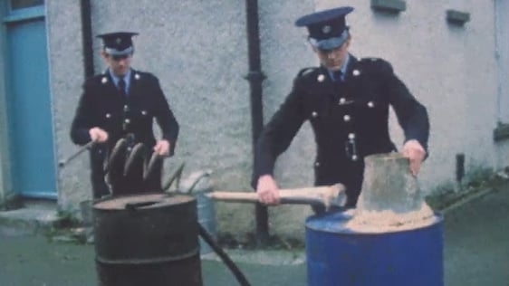 Gardaí with seized poteen still (1975)