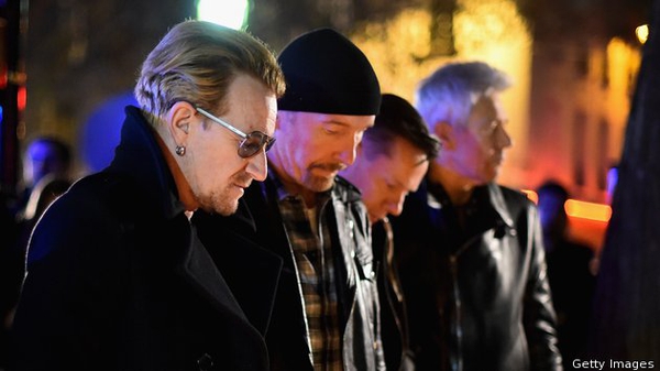 U2 pay their respects at the Bataclan in Paris