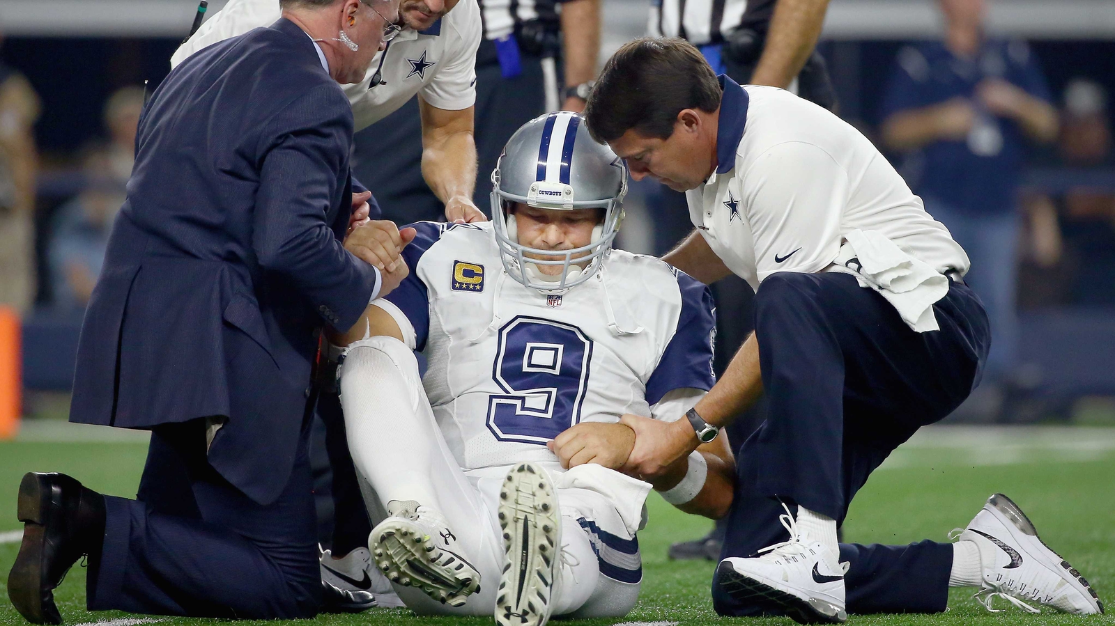 Tony Romo injured as Panthers beat Cowboys to move to 11-0, NFL