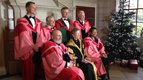 Back row: Rory O'Neill, Tomi Reichental, Trinity Provost and President Dr Patrick Prendergast and Fr Peter McVerry. Front row: David Norris, Chancellor of Trinity Mary Robinson and Graca Machel