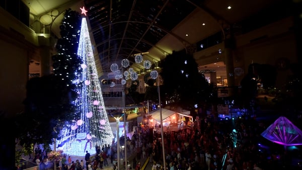 The tree features giant Christmas baubles and is lit by more than half a million lights