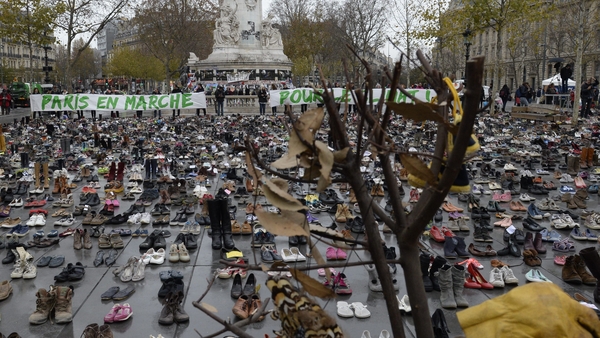 Activists laid out more than 20,000 pairs of shoes in the Place de la Republique in Paris to symbolise absent marchers