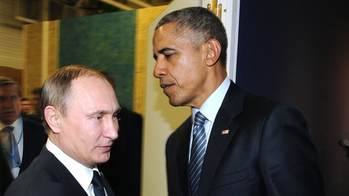 Barack Obama and Vladimir Putin meet at the summit in Paris