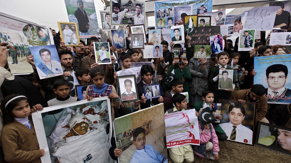 Hundreds had protested outside a Pakistani school over the 'sluggish' investigation into the 2014 attack