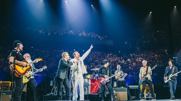 U2 and Eagles of Death Metal on stage in Paris