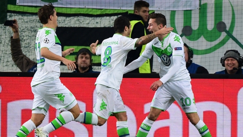 Wolfsburg's Vieirinha (C) celebrates after putting his side in front in the first half with a stunning team goal