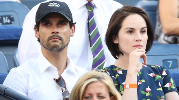 John Dineen and Michelle Dockery pictured at the US Open in September 2013