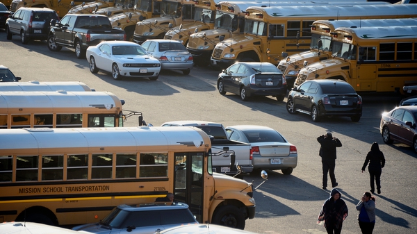 LA school bus drivers sit idle following school closures over threat