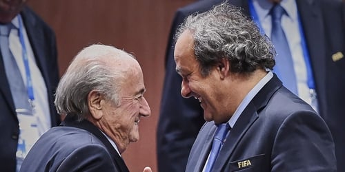Sepp Blatter and Michel Platini together during happier times for the pair, who are now facing FIFA corruption charges