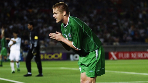 Duff celebrates by bowing to the crowd after his goal against Saudi Arabia at the 2002 World Cup