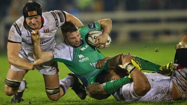 Connacht's Jack Carty is tackled by Ulster's Franco van der Merwe and Nick Williams