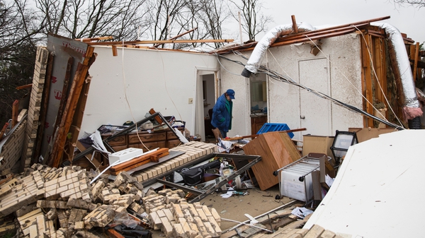 A heavily damaged residence is seen in the aftermath of a tornado in Rowlett, Texas