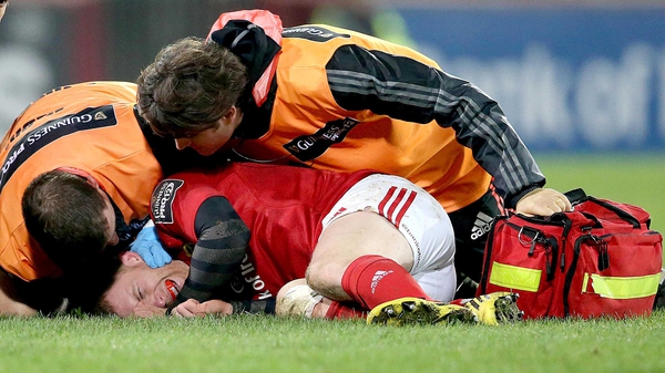 Keith Earls lies on the turf after suffering a neck injury against Leinster