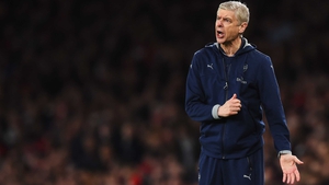An animated Arsene Wenger encourages his troops at the Emirates