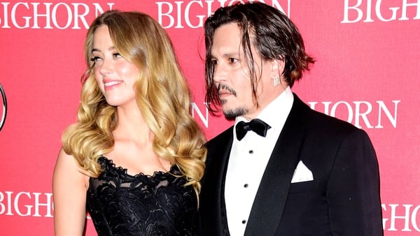Amber Heard's lawyer denies Depp 'blackmailing' claim