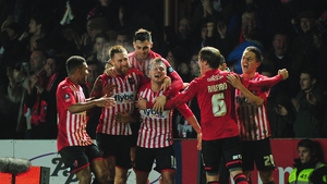 Exeter players celebrate scoring their second goal