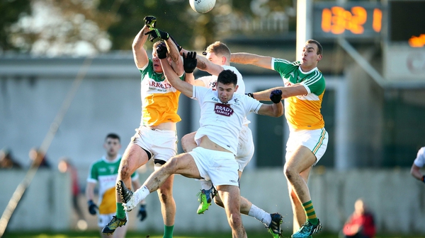 Offaly's Shane Nally and Jason Gethings soar for a high ball against Matty Byrne and Rob Kelly of Kildare