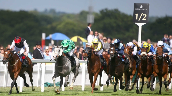 Free Eagle ridden by Pat Smullen (L) en route to winning the 2015 Prince of Wales's Stakes