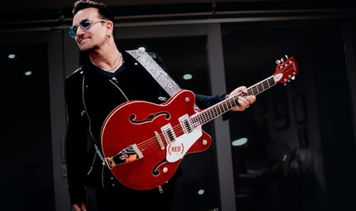 Bono's red Gretsch is up for auction. Fire, three chords, and truth not included