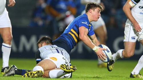 Leinster's Garry Ringrose is challenege by Matt Banahan of Bath at the RDS