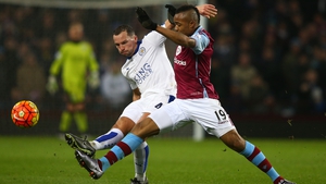 Danny Drinkwater of Leicester City and Aston Villa's Jordan Ayew compete during the game at Villa Park