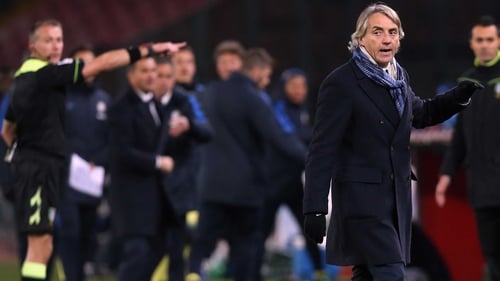 Roberto Mancini leaces the field during the heated cup clash with Napoli