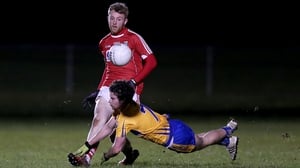 Cork's Killian O'Hanlon gets the ball away under pressure from Cian O'Dea of Clare during Friday's McGrath Cup final