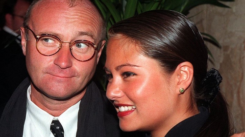 48-years old Phil Collins with his then fianceé Orianne Cevey, aged 27, in 1997.