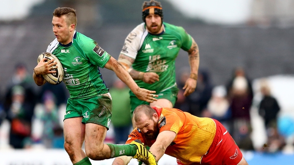 Jack Carty of Connacht gets away from Scarlets' Phil John during Satruday's win at the Sportsgrounds