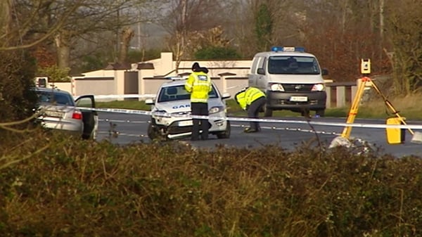 The car collided with a parked Garda patrol car, injuring two gardaí