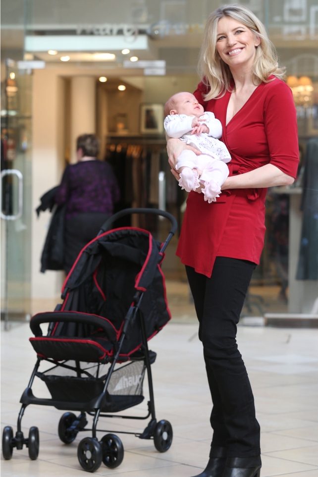 How wonderful does Pamela look with doting baby Gracie?