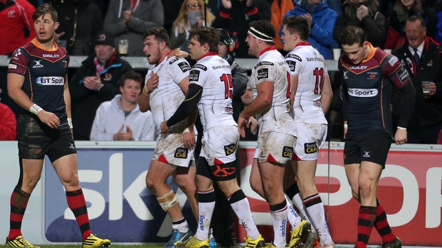 Sean Reidy celebrates his try with team mates