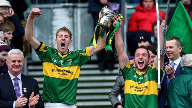 Philip Roche and Ger Aylward lift the cup