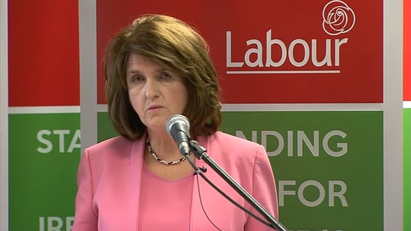 Joan Burton defended Labour's plan to cut the USC