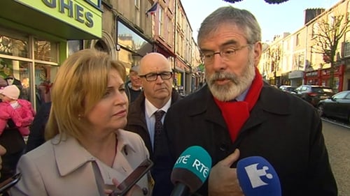 Gerry Adams say it's ironic that Sinn Féin are being accused of being populist when other parties are seizing on the shooting of two people