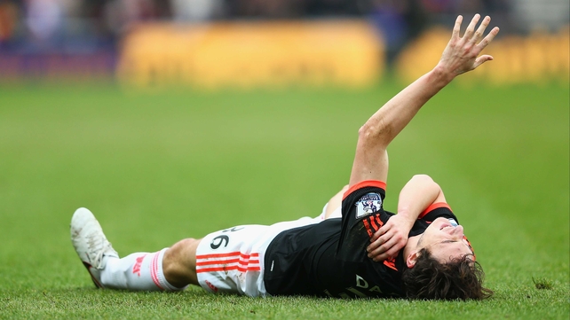 Matteo Darmian lies injured