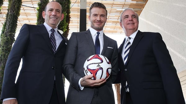 Beckham (centre) with MLS Commissioner Don Gerber and former Mayor of Miami Carlos Gimenez