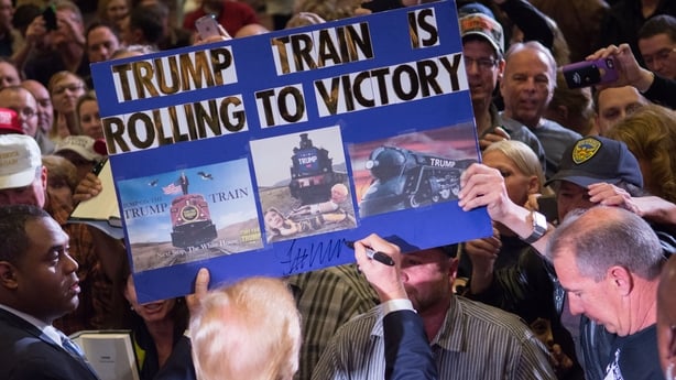 Donald Trump greets supporters following a rally at the Nugget in Sparks, Nevada.