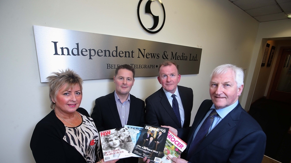 Richard McClean, MD of INM (2nd right), and Simon Snoddy, Finance Director of INM (2nd left) pictured with Gladys and James Greer