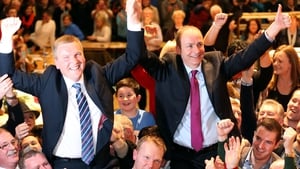 Michael McGrath and Micheál Martin celebrating their wins in Cork at the weekend