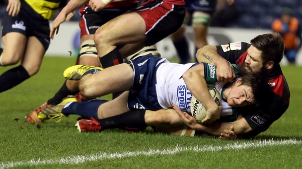 Connacht's AJ MacGinty scores a try despite being tackled by Cornell Du Preez of Edinburgh
