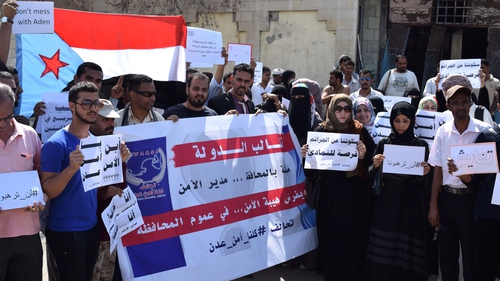 Yemenis gather outside Aden's security department to protest against the care home attack