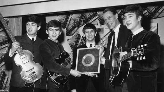 George Martin pictured with The Beatles 