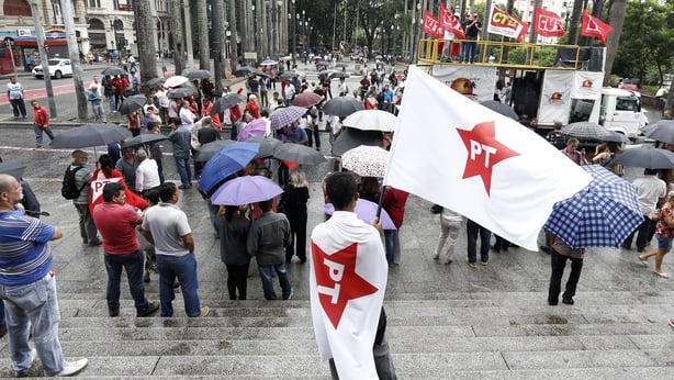 Unionists and members of the Workers Party (PT) demonstrate in support of Brazilian former president Luiz Inacio Lula da Silva