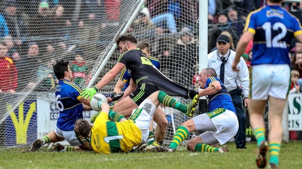 Mayo's Aidan O'Shea is held back on the goal line by Kieran Donaghy of Kerry