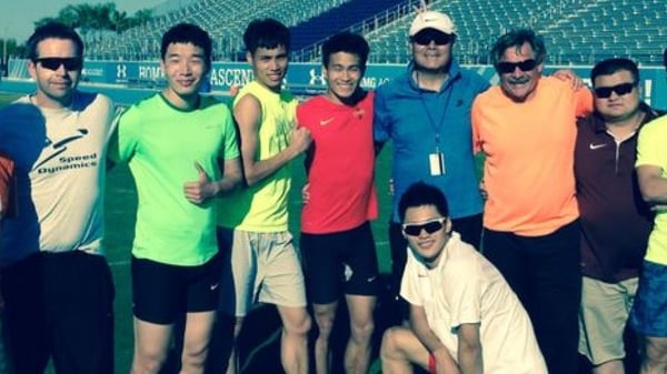 John Coghlan (far left) with members of the Chinese sprint team and other coaches