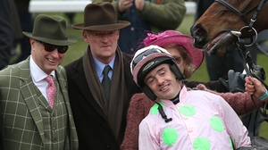 Jockey Ruby Walsh alongside owner Rich Ricci and trainer Willie Mullins after winning The Racing Post Arkle Trophy on Douvan