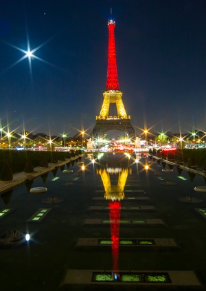 The Eiffel Tower is illuminated in the national colours of Belgium in tribute to the victims of the attacks in Belgium