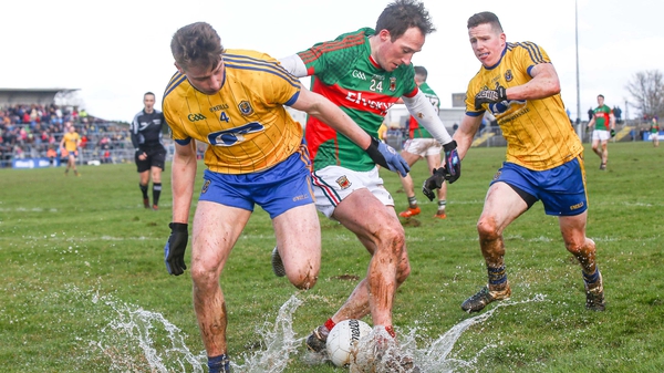Roscommon and Mayo players splash around at Hyde Park during their Division 1 meeting last Sunday